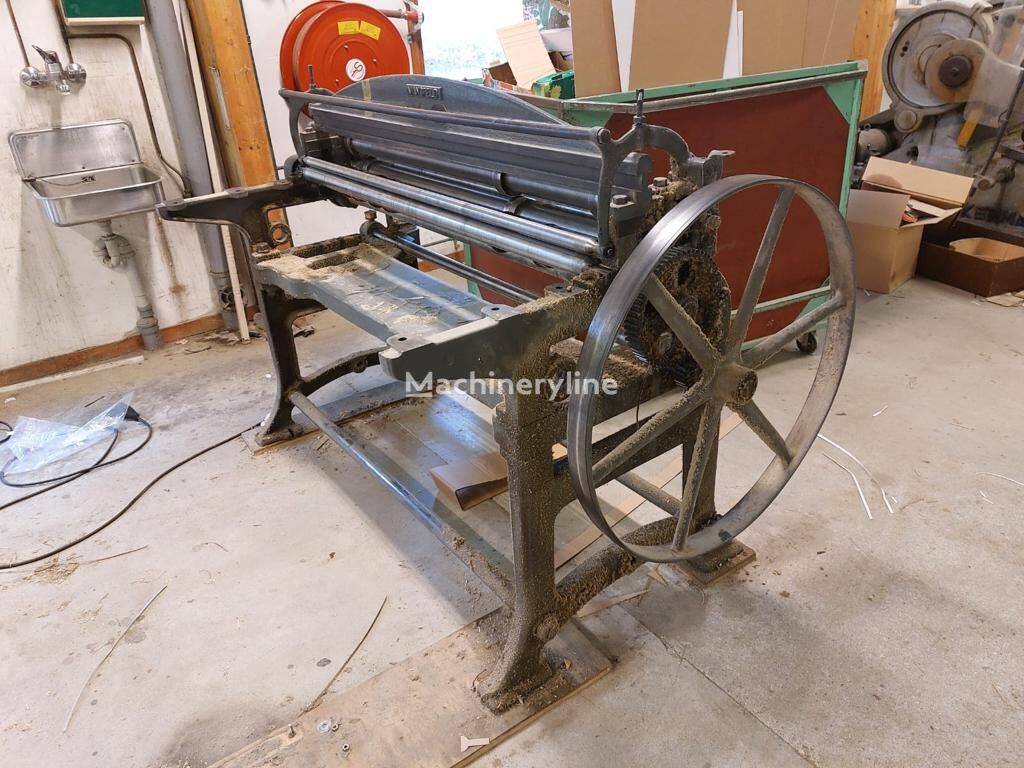 μηχανή επεξεργασίας ξυλείας Mansfeld Rotary Board Cutter
